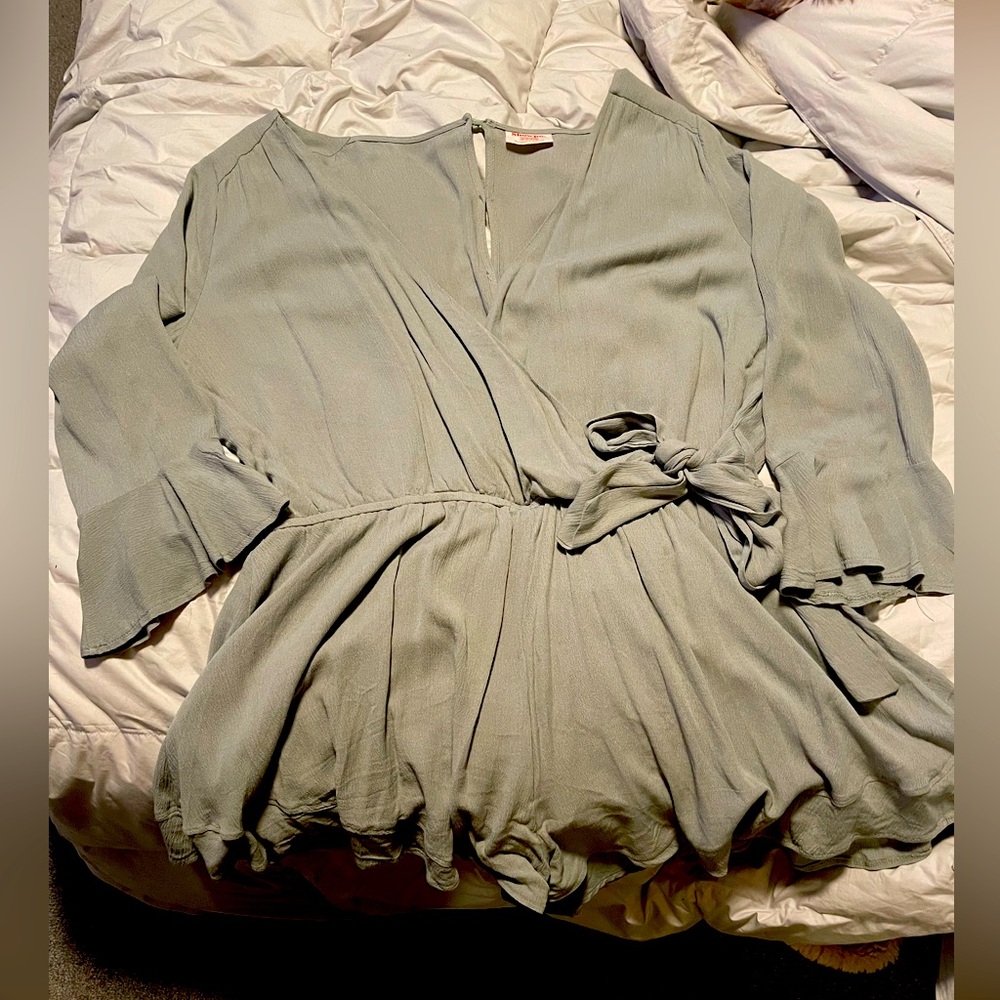 Showpo size 16 light green faux wrap romper. Buttons down back.